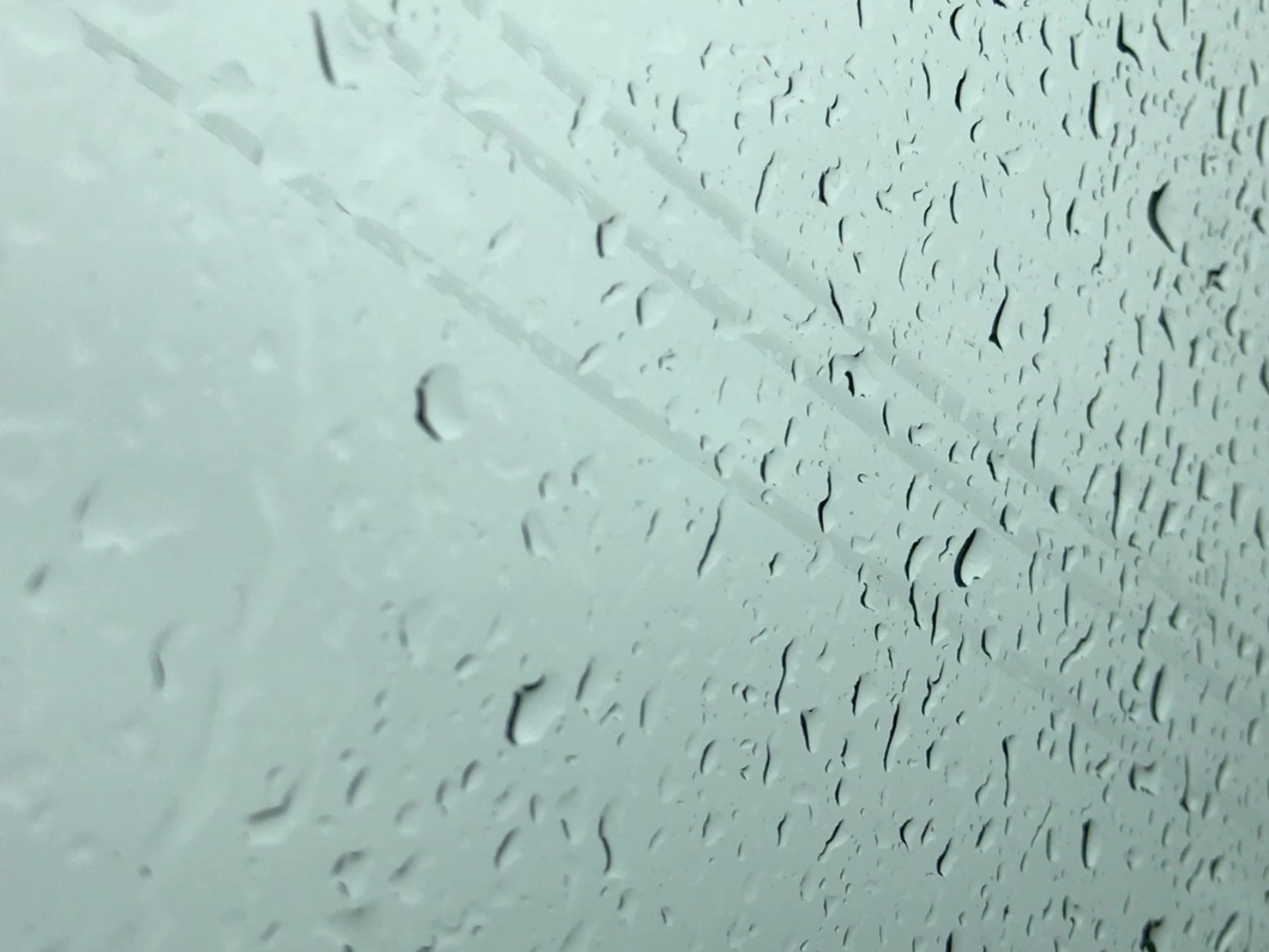 Raindrops Falling on Window