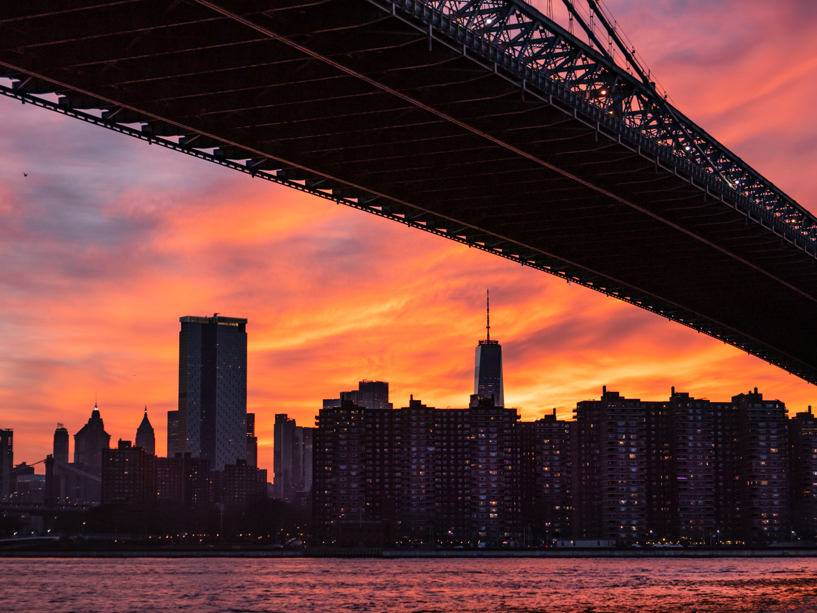 New York City Skyline and Bridge in Sunset